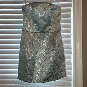 Clue and silver strapless cocktail dress